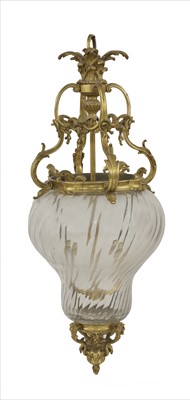 Lot 674 - A Louis XV-style bronze and clear glass ceiling light