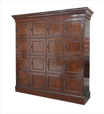Lot 894 - A large sixteen-cupboard cabinet