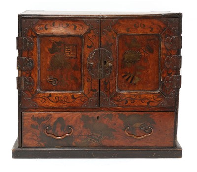 Lot 239 - A Japanese lacquered and parquetry table cabinet