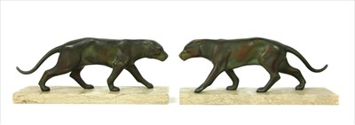 Lot 442 - A pair of Art Deco spelter panthers on marble plinths