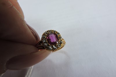 Lot 60 - A late Victorian ruby and diamond cushion-shaped cluster ring