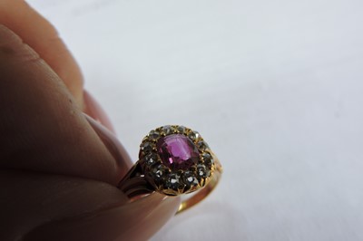 Lot 60 - A late Victorian ruby and diamond cushion-shaped cluster ring