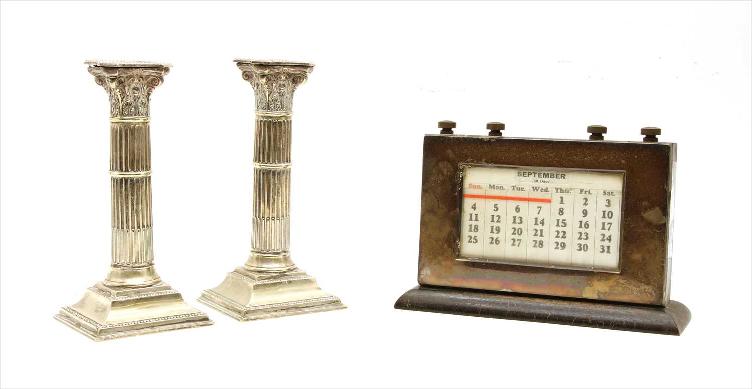 Lot 153 - A silver table top perpetual calendar
