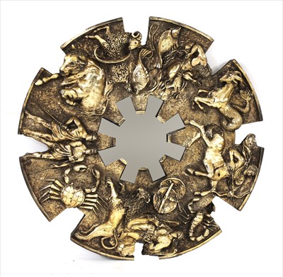 Lot 679 - A contemporary fibreglass and gilt zodiac mirror
