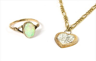 Lot 65 - A gold single stone opal ring