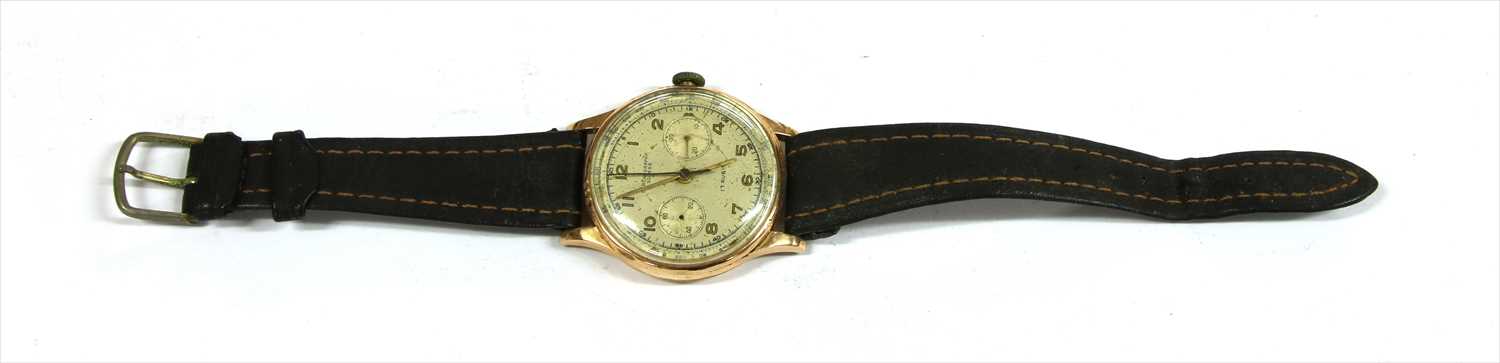 Lot 82 - An gentlemen's 18ct gold Chronograph Suisse mechanical strap watch