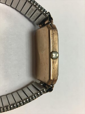 Lot 84 - An Art Deco 9ct gold mechanical strap watch