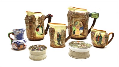 Lot 223 - Four Royal Doulton seriesware jugs