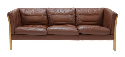 Lot 514 - A Stouby brown leather three-seater settee