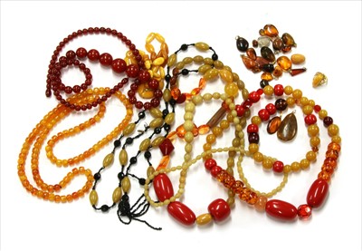 Lot 92 - A single row graduated tumbled amber bead necklace