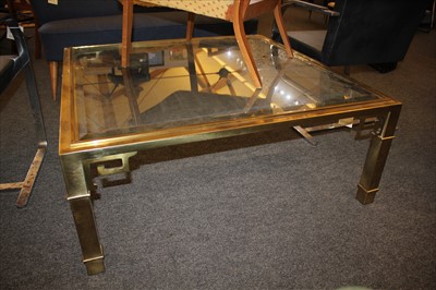 Lot 422 - A brass Mastercraft table