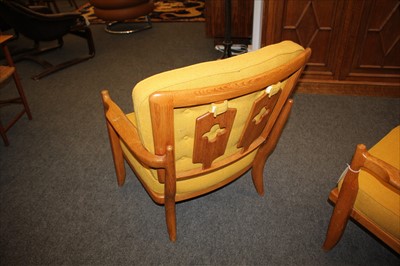 Lot 306 - A pair of French oak lounge chairs