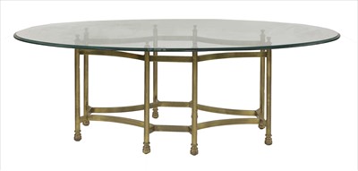 Lot 579 - An oval glass top centre table