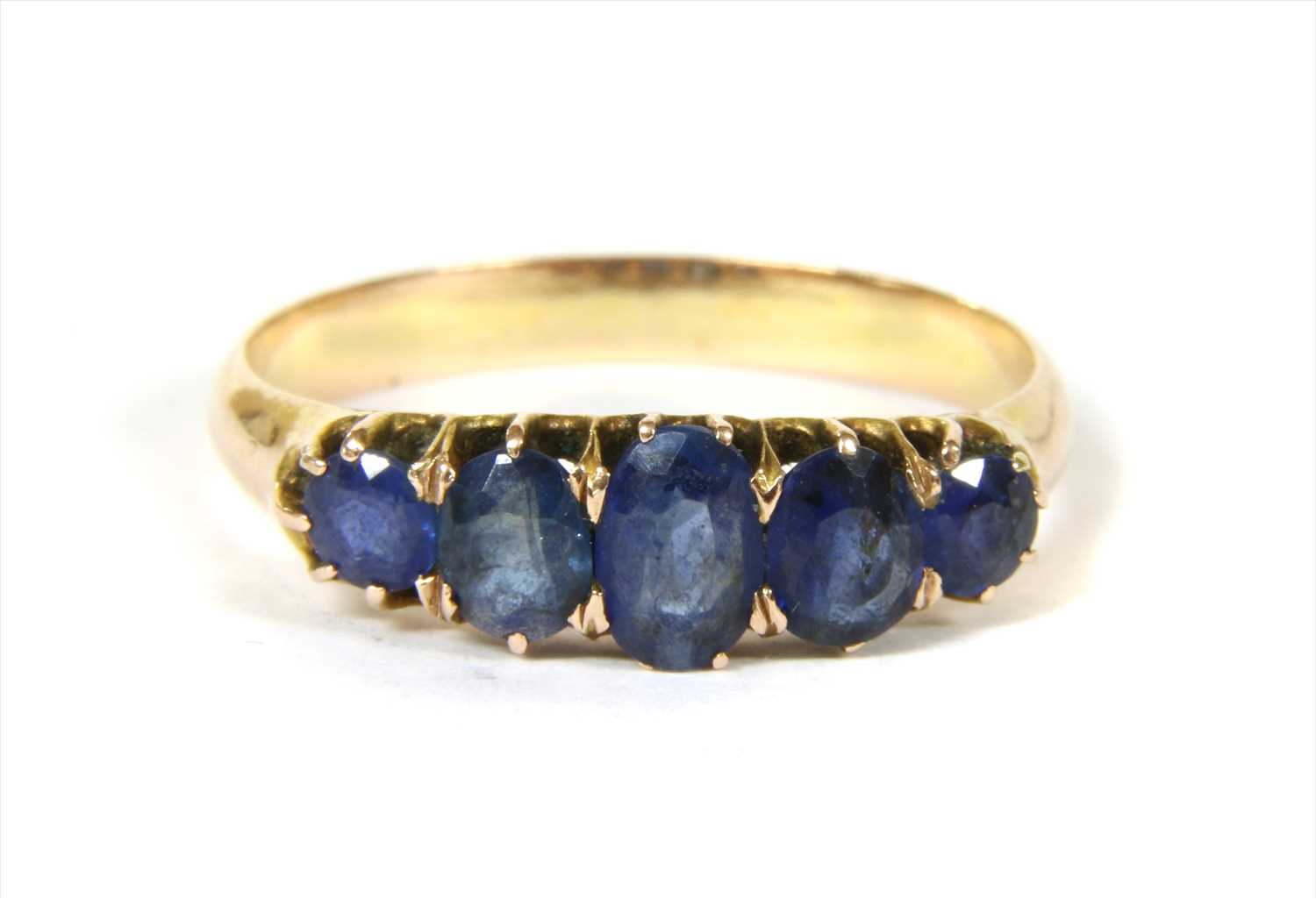 Lot 9 - A gold five stone sapphire ring
