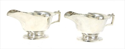 Lot 190 - A pair of silver sauceboats