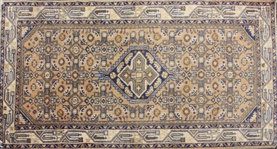Lot 445 - An Eastern prayer rug