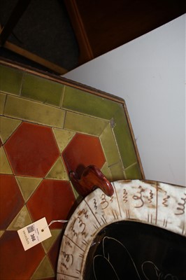Lot 15 - A mahogany and tile top hexagonal table