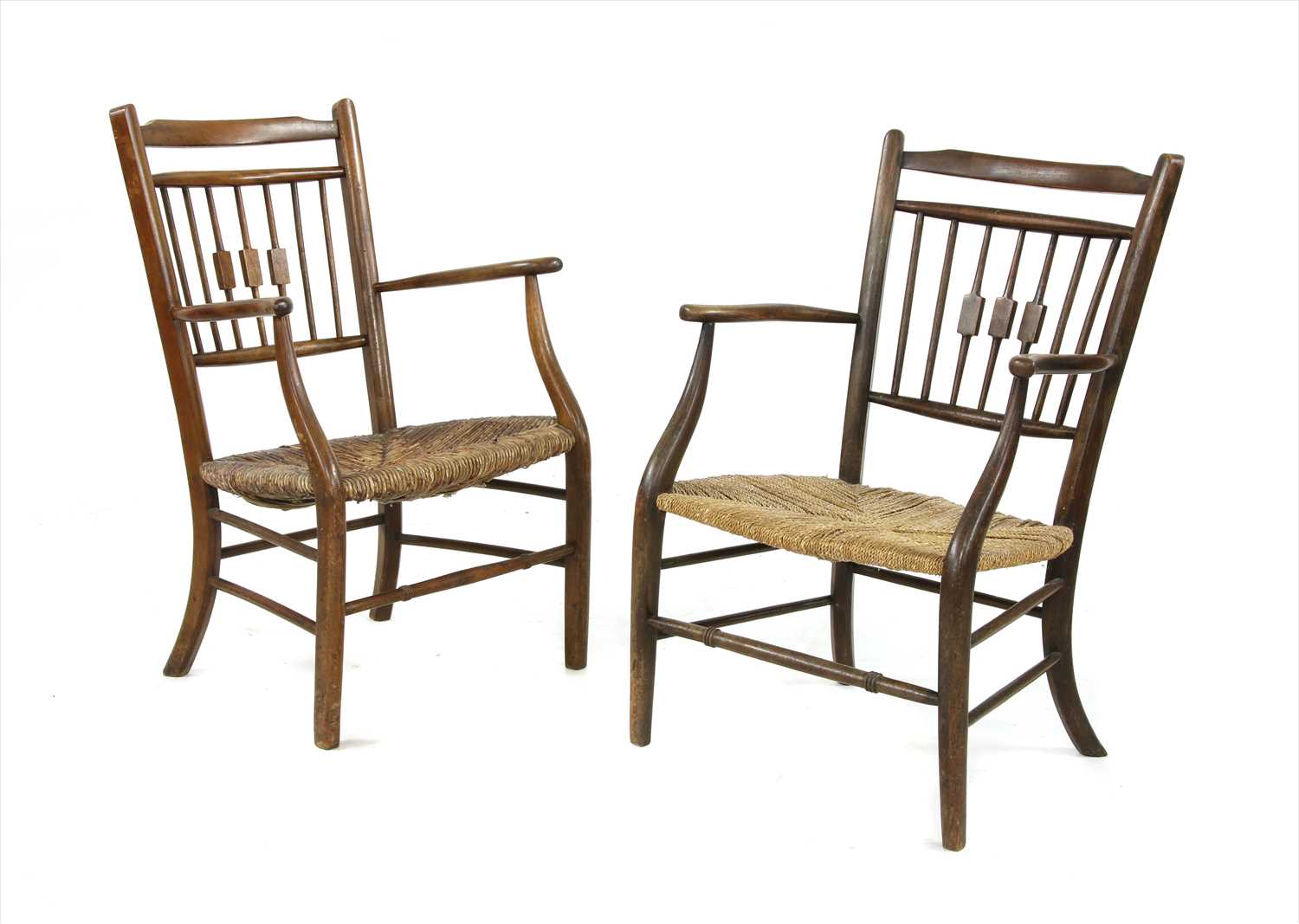 Lot 73 - Two Arts & Crafts rush-seated armchairs