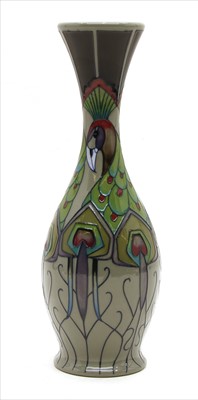 Lot 298 - A Moorcroft tubeline decorated 'Peacock Parade' pattern bottle vase