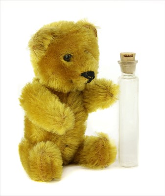 Lot 1184 - A gold plush teddy bear scent bottle