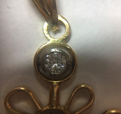 Lot 83 - A gold diamond cross pendant