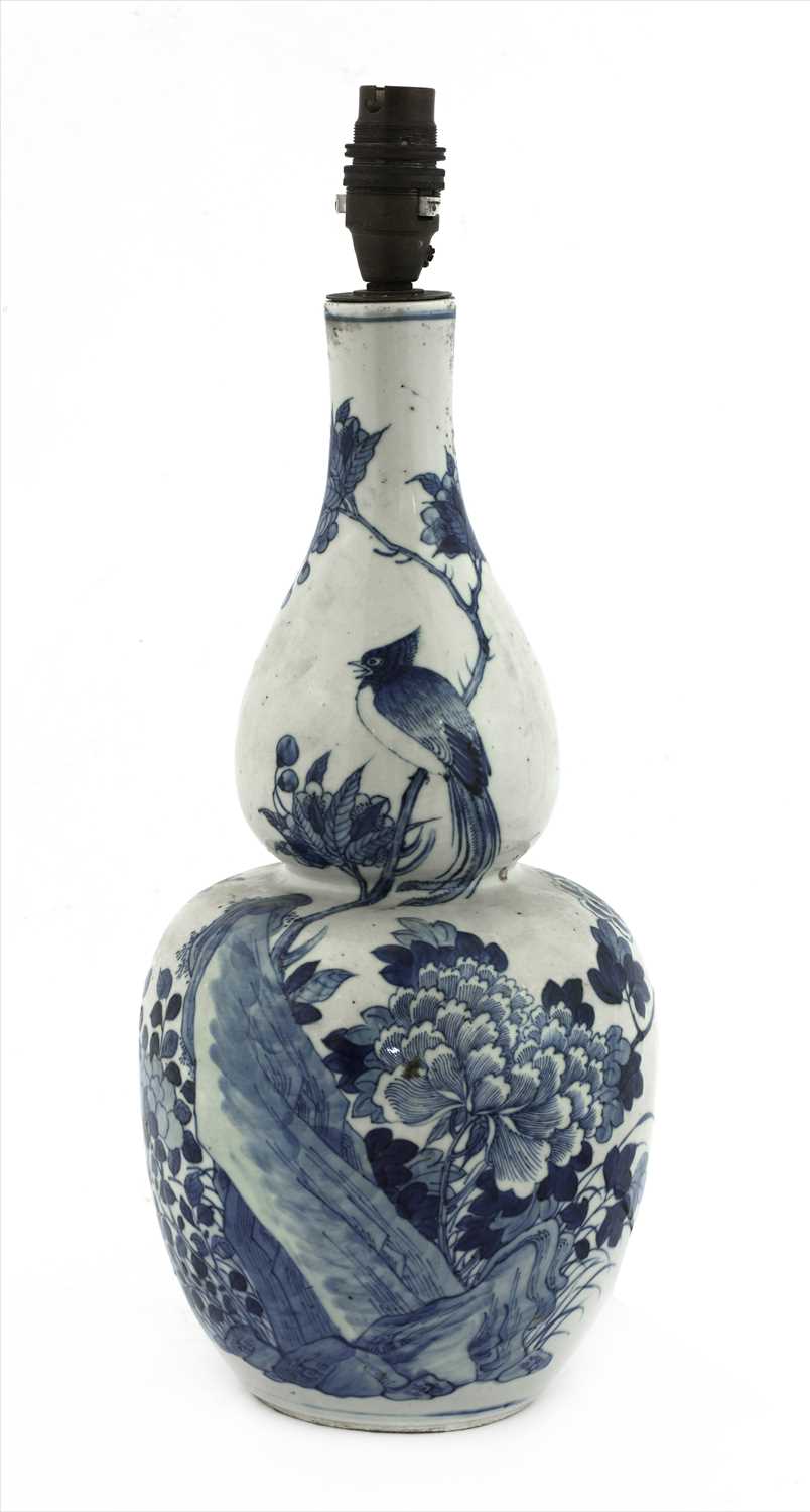 Lot 183 - A Chinese blue and white double gourd vase