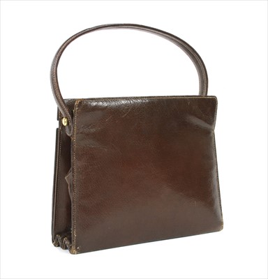 Lot 1003 - A vintage Gucci leather writing travel handbag