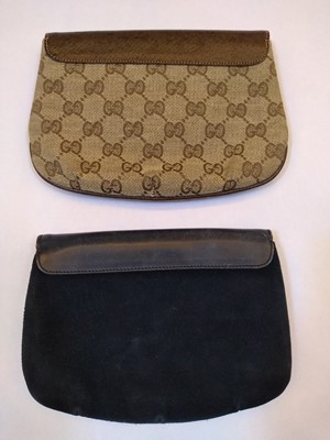 Lot 1002 - Two vintage Gucci clutch
