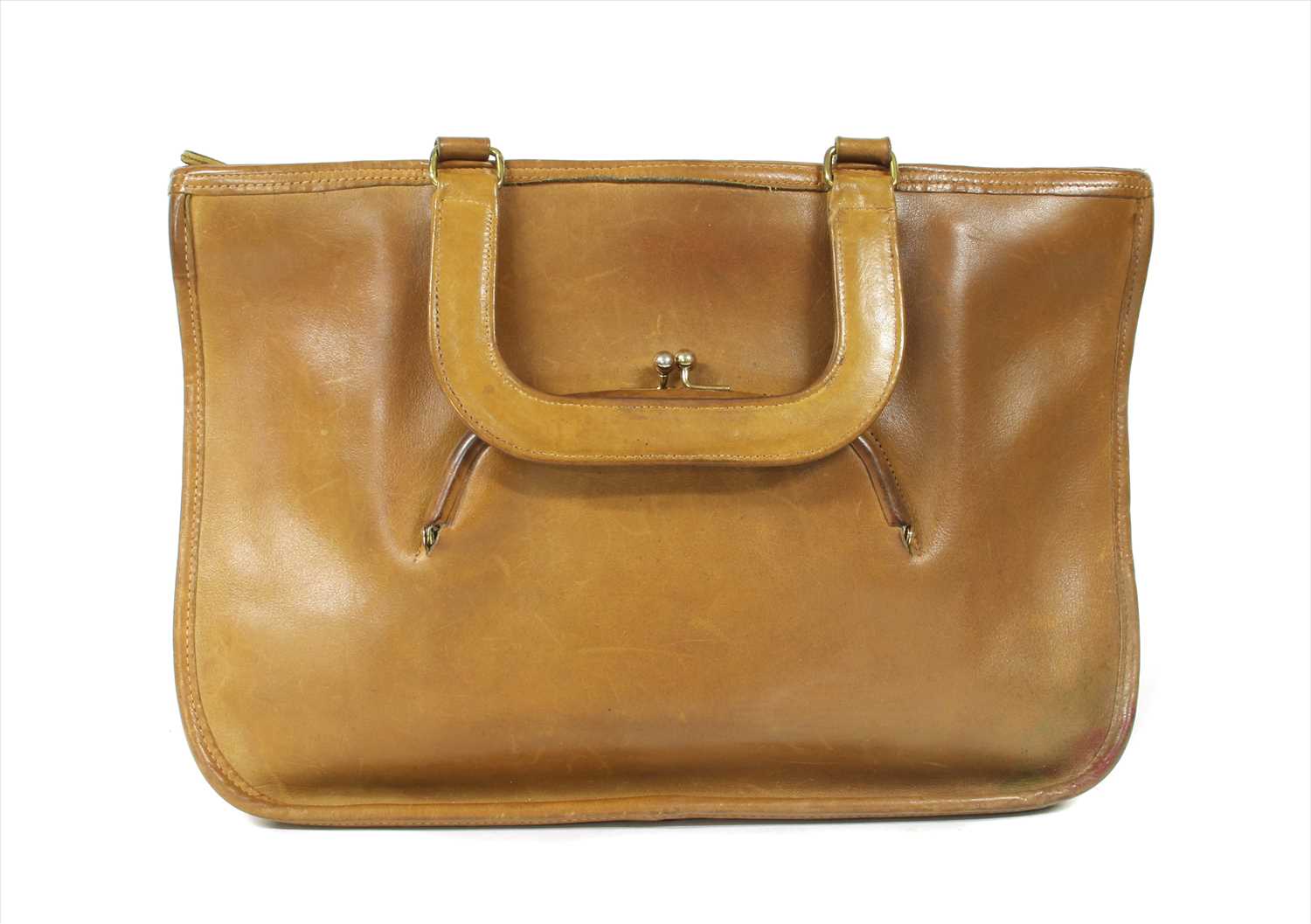 Lot 1020 - A Coach tan leather tote bag