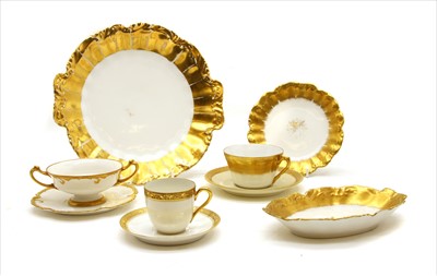Lot 235 - A large collection of Limoges gilt decorated dinnerware