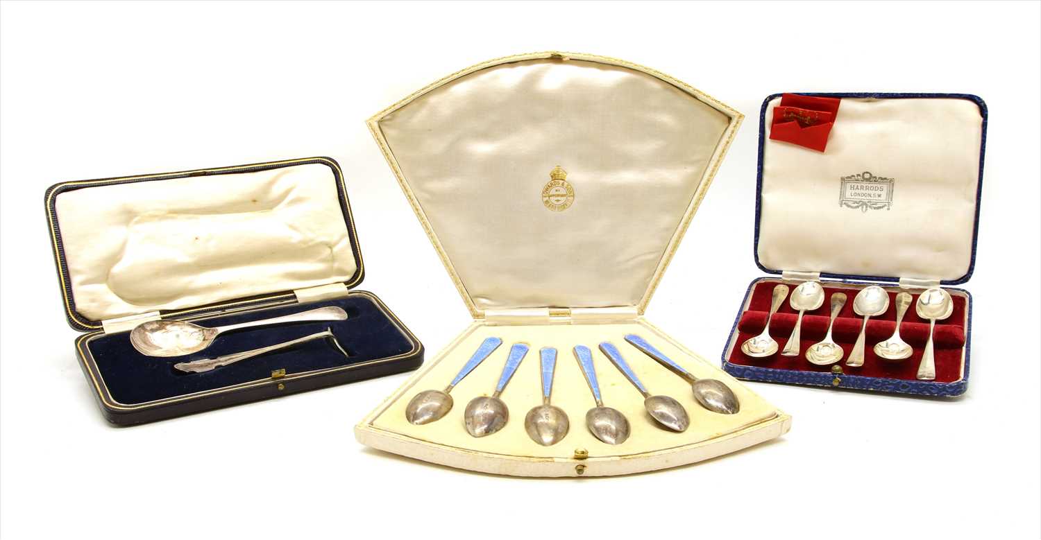 Lot 114 - A cased set of early 20th century silver and guilloche enamel spoons