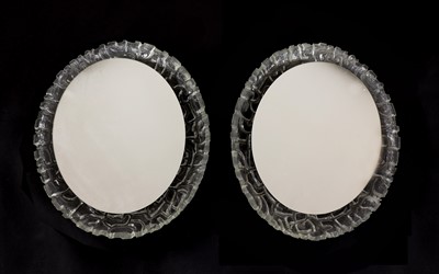 Lot 500 - A pair of moulded plastic wall mirrors