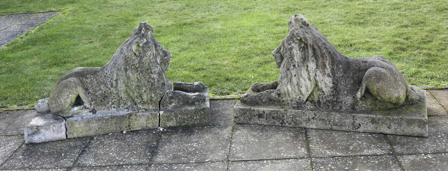 Lot 123 - A pair of stone lions