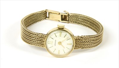 Lot 86 - A ladies' 9ct gold Garrard mechanical bracelet watch