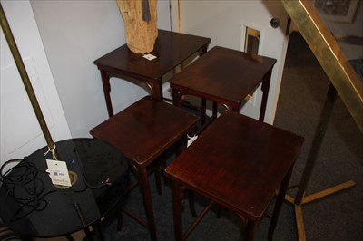 Lot 42 - A nest of four bentwood tables