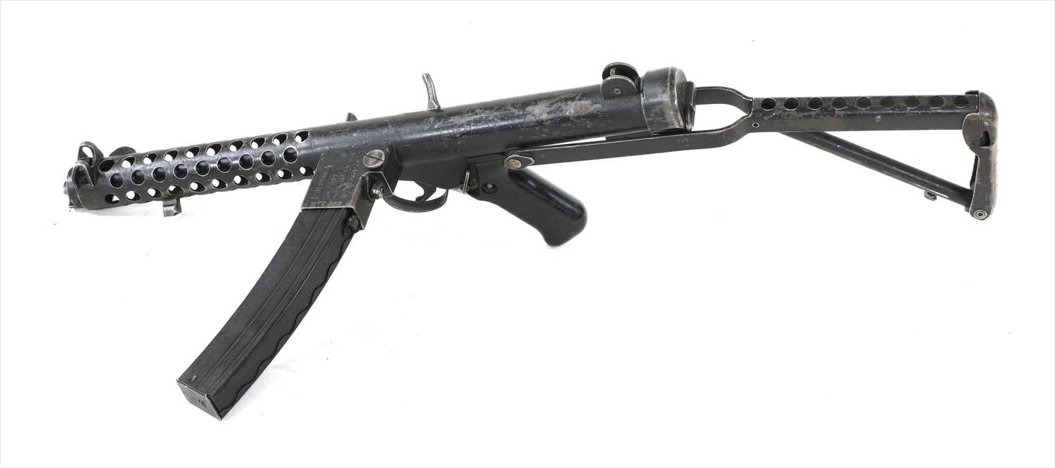 Lot 342 - A STIRLING SUB-MACHINE GUN