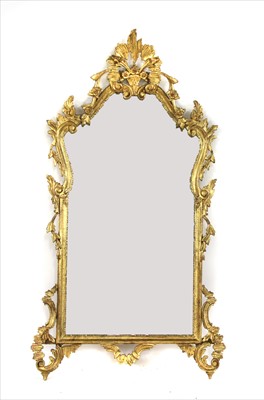 Lot 433 - A carved giltwood wall mirror