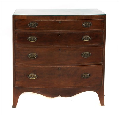 Lot 466 - A George III mahogany bow front chest of four drawers