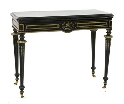 Lot 411 - An ebonised tortoiseshell and gilt metal and brass mounted foldover card table