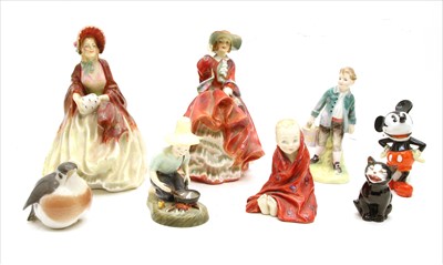 Lot 204 - A collection of ceramic figures