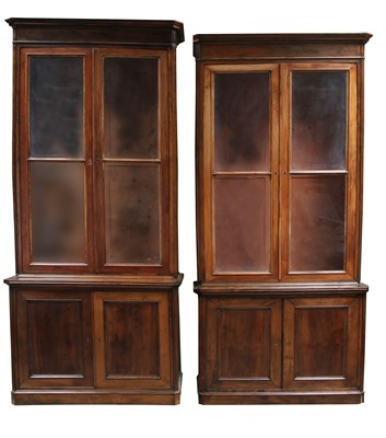Lot 448 - A pair of French fruitwood bookcase cabinets