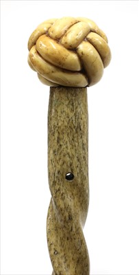 Lot 174 - A carved marine ivory walking stick