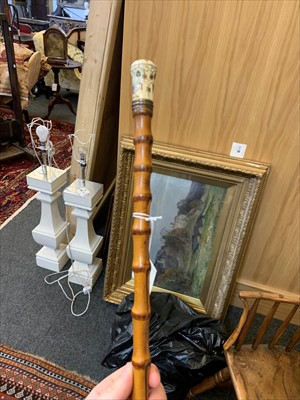 Lot 168 - An ivory and piqué walking stick
