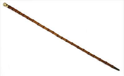 Lot 168 - An ivory and piqué walking stick
