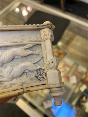 Lot 150 - A carved bone and ivory hunting casket