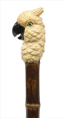 Lot 182 - A carved ivory cockatoo walking stick