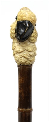 Lot 182 - A carved ivory cockatoo walking stick