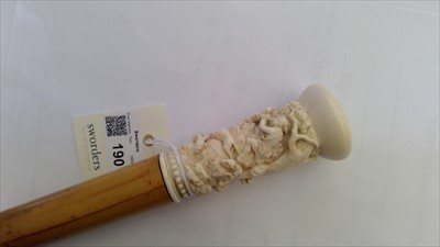 Lot 190 - Two carved ivory walking sticks