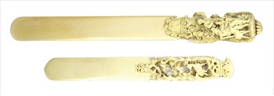 Lot 142 - Two carved ivory letter openers