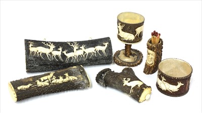 Lot 131 - Six carved antler stag hunting items